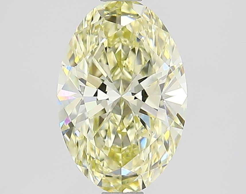 Loose Lab Diamond IGI Oval 1.65ct Fancy Yellow VS2: Loose Lab Diamond IGI Oval 1.65ct Fancy Yellow VS2 This 1.65ct Loose Lab Diamond has an oval cut, Fancy Yellow color, and VS2 clarity, with excellent polish and symmetry, certified by IGI, at dimensio