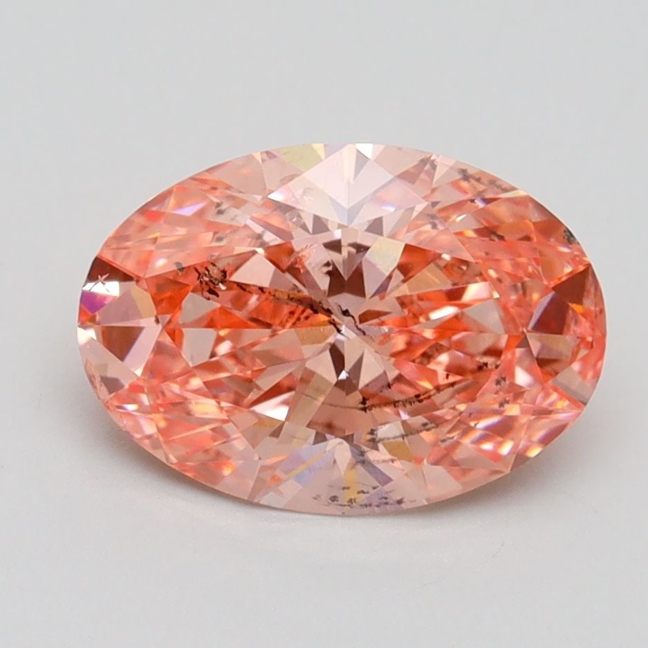 Loose Lab Diamond IGI Oval 2.02ct Fancy Vivid Pink SI2: Loose Lab Diamond IGI Oval 2.02ct Fancy Vivid Pink SI2 This Loose Lab Diamond is a 2.02ct oval cut, Fancy Vivid Pink with SI2 clarity, certified by IGI. It measures 10.21L x 7.15W x 4.44H mm and featu