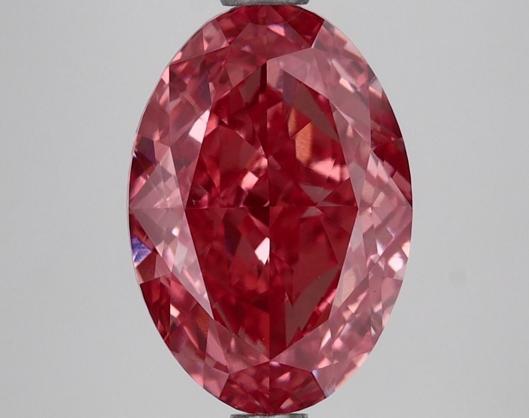 Loose Lab Diamond IGI Oval 2.79ct Fancy Vivid Pink VVS2: Loose Lab Diamond IGI Oval 2.79ct Fancy Vivid Pink VVS2 Loose Lab Diamond IGI Oval, weighing 2.79ct, with fancy vivid pink color and clarity VVS2, featuring excellent polish and symmetry. Certified by