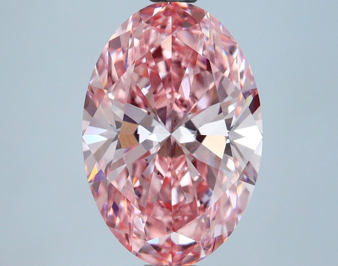 Loose Lab Diamond IGI Oval 2.94ct Fancy Vivid Pink VS2: Loose Lab Diamond IGI Oval 2.94ct Fancy Vivid Pink VS2 The 2.94ct oval loose lab diamond showcases a Fancy Vivid Pink color and VS2 clarity, featuring excellent polish and symmetry, certified by IGI.