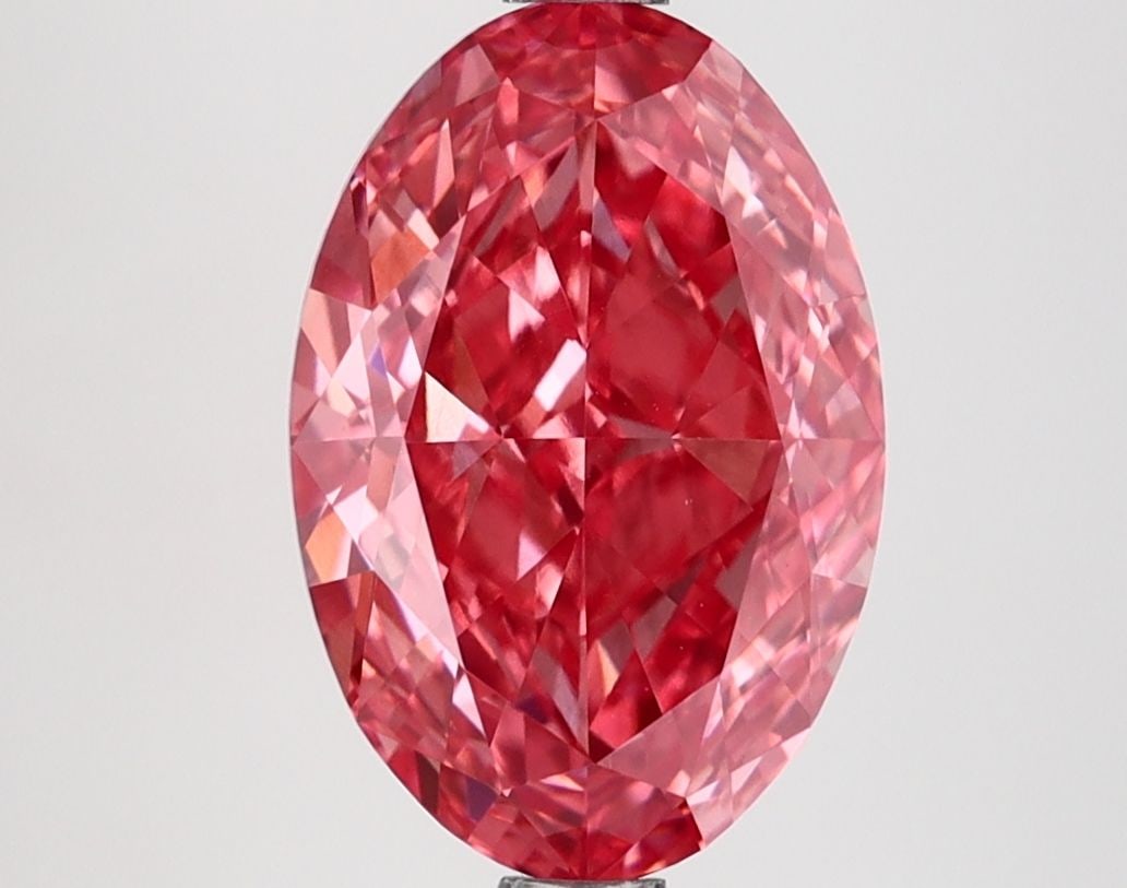 Loose Lab Diamond IGI Oval 3.13ct Fancy Vivid Pink VS1: Loose Lab Diamond IGI Oval 3.13ct Fancy Vivid Pink VS1 Loose lab-grown diamond certified by IGI, weighing 3.13ct with an oval cut, color fancy vivid pink, clarity VS1, exhibiting excellent polish and