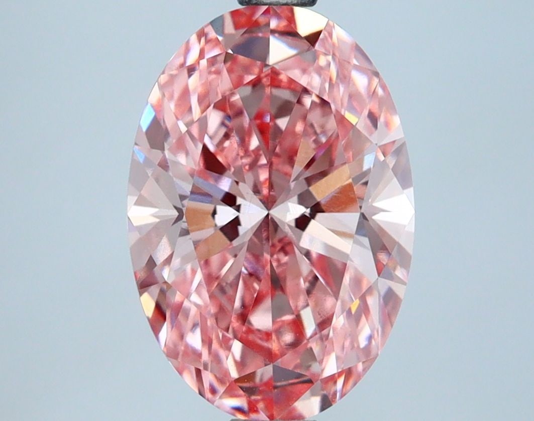 IGI 2.74ct Oval Fancy Vivid Pink VS1 - Loose Lab Diamond: IGI 2.74ct Oval Fancy Vivid Pink VS1 - Loose Lab Diamond This IGI certified loose lab diamond weighs 2.74 carats, showcases a Fancy Vivid Pink color, and has VS1 clarity, with good polish and symmetry