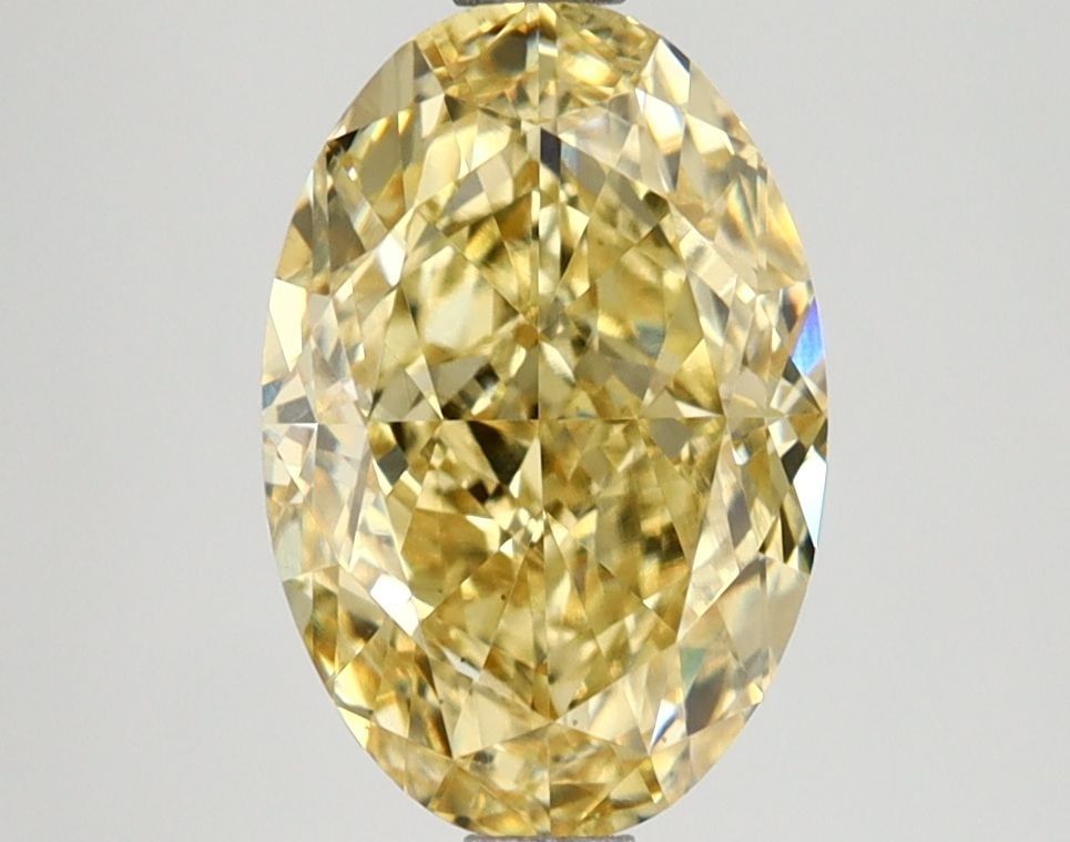 Loose Lab Diamond IGI Oval 2.79ct Fancy Intense Yellow VS1: Loose Lab Diamond IGI Oval 2.79ct Fancy Intense Yellow VS1 Loose Lab Diamond IGI Oval 2.79ct Fancy Intense Yellow VS1 measures 10.4L x 6.95W x 4.75H, offering excellent polish and symmetry, and is cer