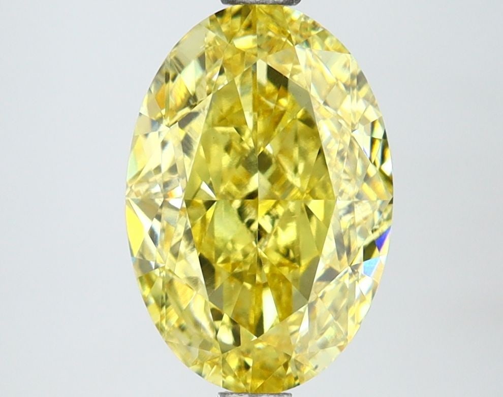 Loose Lab Diamond IGI Oval 2.7ct Fancy Vivid Yellow VS1: Loose Lab Diamond IGI Oval 2.7ct Fancy Vivid Yellow VS1 This 2.7ct Loose Lab Diamond certified by IGI has an oval shape with a Fancy Vivid Yellow color and clarity VS1, featuring good polish and good