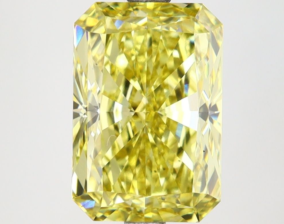 Loose Lab Diamond IGI Radiant 3.56ct Fancy Intense Yellow VS1: Loose Lab Diamond IGI Radiant 3.56ct Fancy Intense Yellow VS1 A loose lab-grown diamond weighing 3.56ct with a fancy intense yellow color and VS1 clarity, measuring 10.39L x 7.04W x 4.99H, certified b
