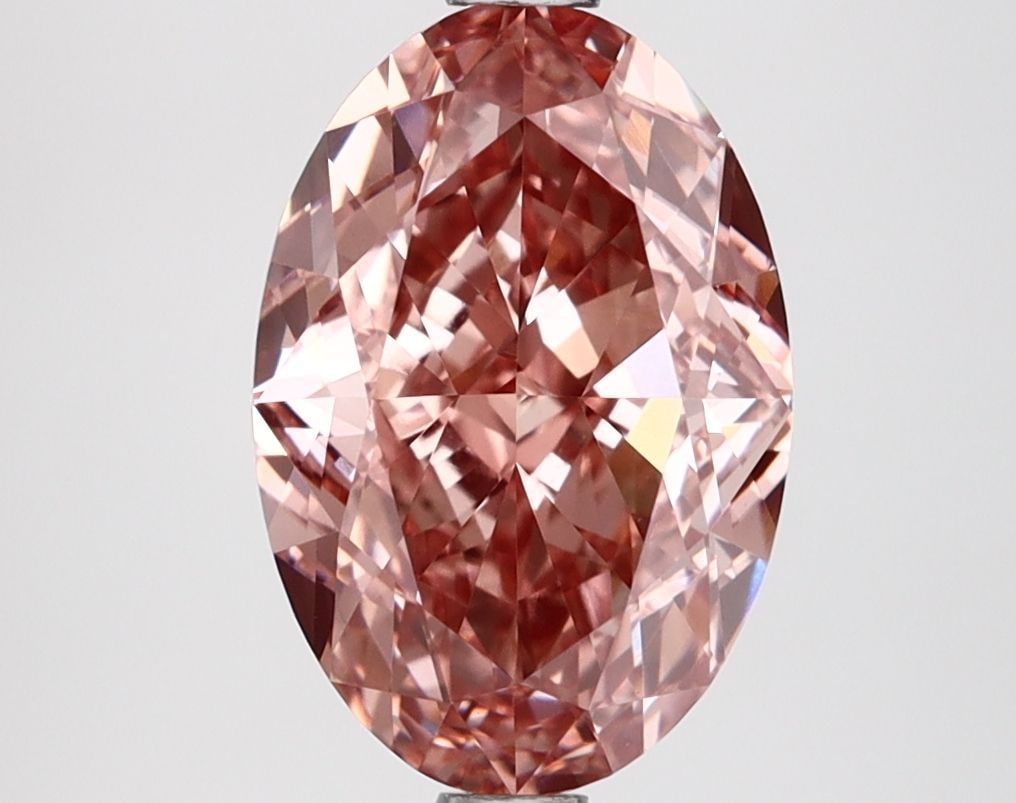 Loose Lab Diamond IGI Oval 3.15ct Fancy Vivid Brownish Pink VVS2: Loose Lab Diamond IGI Oval 3.15ct Fancy Vivid Brownish Pink VVS2 Loose Lab Diamond IGI Oval, 3.15ct, Fancy Vivid Brownish Pink color, VVS2 clarity, with EX polish and symmetry; measures 10.94L x 7.42W