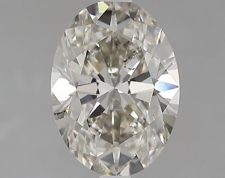Loose Lab Diamond IGI Oval 2.11ct K SI2: Loose Lab Diamond IGI Oval 2.11ct K SI2 A 2.11ct oval loose lab diamond designated as K color and SI2 clarity, measuring 9.86L x 7.16W x 4.61H, with IGI certification. Item Specifics: Source: This Is