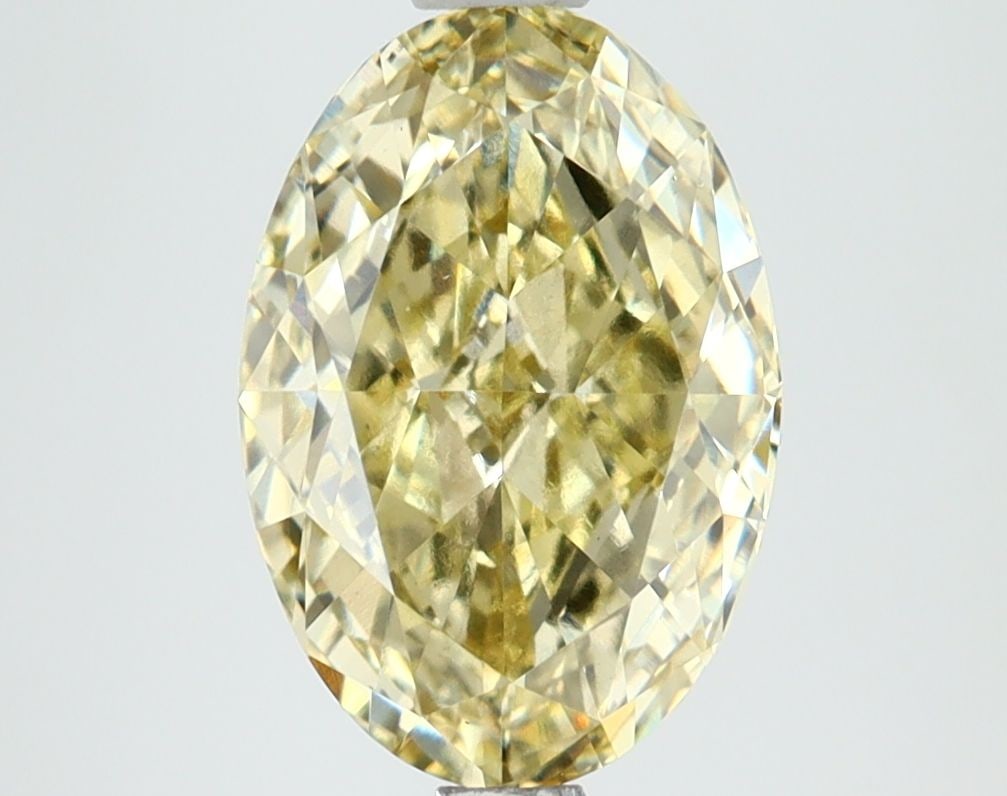IGI Loose Lab Diamond 2.91ct Oval Fancy Yellow VS1: IGI Loose Lab Diamond 2.91ct Oval Fancy Yellow VS1 IGI Loose Lab Diamond of 2.91ct in an Oval cut, with Fancy Yellow color and VS1 clarity. Certified by IGI, measuring 10.74L x 7.36W x 4.6H. Item