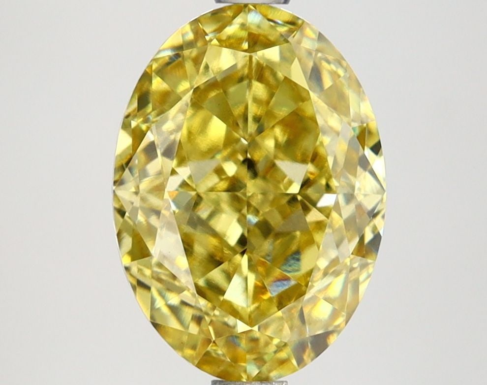 Loose Lab Diamond IGI Oval 3.27ct Fancy Vivid Yellow VVS2: Loose Lab Diamond IGI Oval 3.27ct Fancy Vivid Yellow VVS2 Loose Lab Diamond IGI Oval, 3.27ct, Color: Fancy Vivid Yellow, Clarity: VVS2, Certified by IGI, with measurements of 10.62L x 7.62W x 4.98H. 