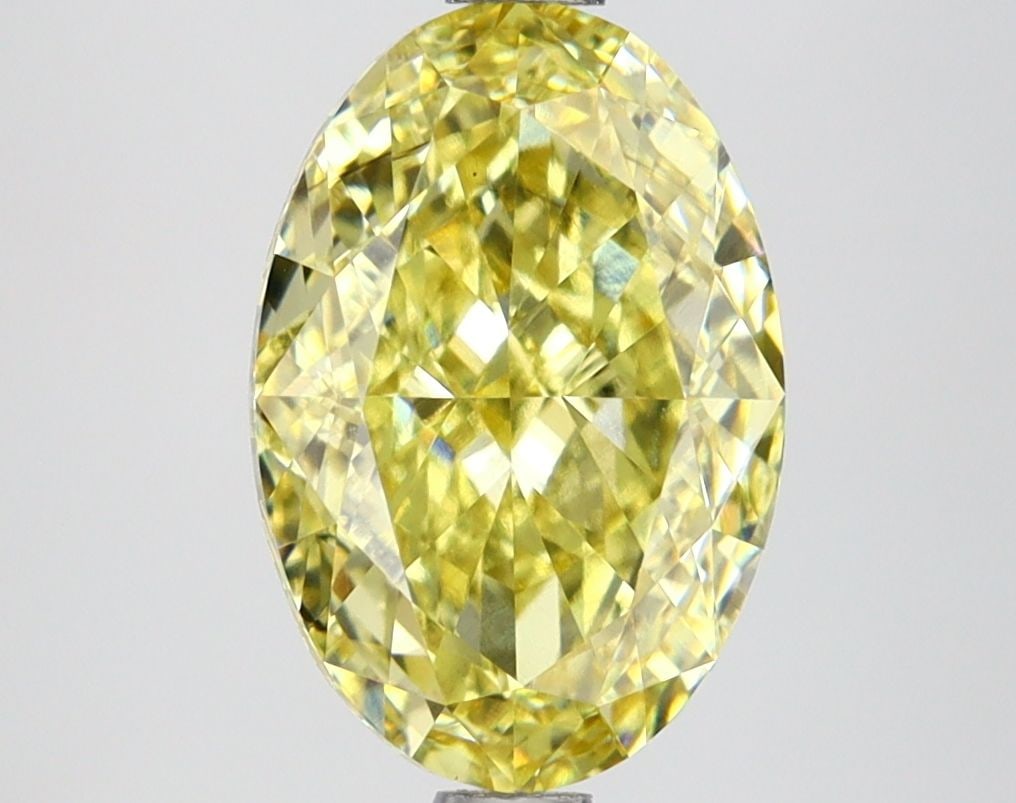 Loose Lab Diamond IGI Oval 2.72ct Fancy Vivid Yellow VS1: Loose Lab Diamond IGI Oval 2.72ct Fancy Vivid Yellow VS1 Loose Lab Diamond IGI Oval, 2.72ct, Fancy Vivid Yellow, VS1 clarity, with excellent polish and symmetry. Certified by IGI, dimensions are 10.5L