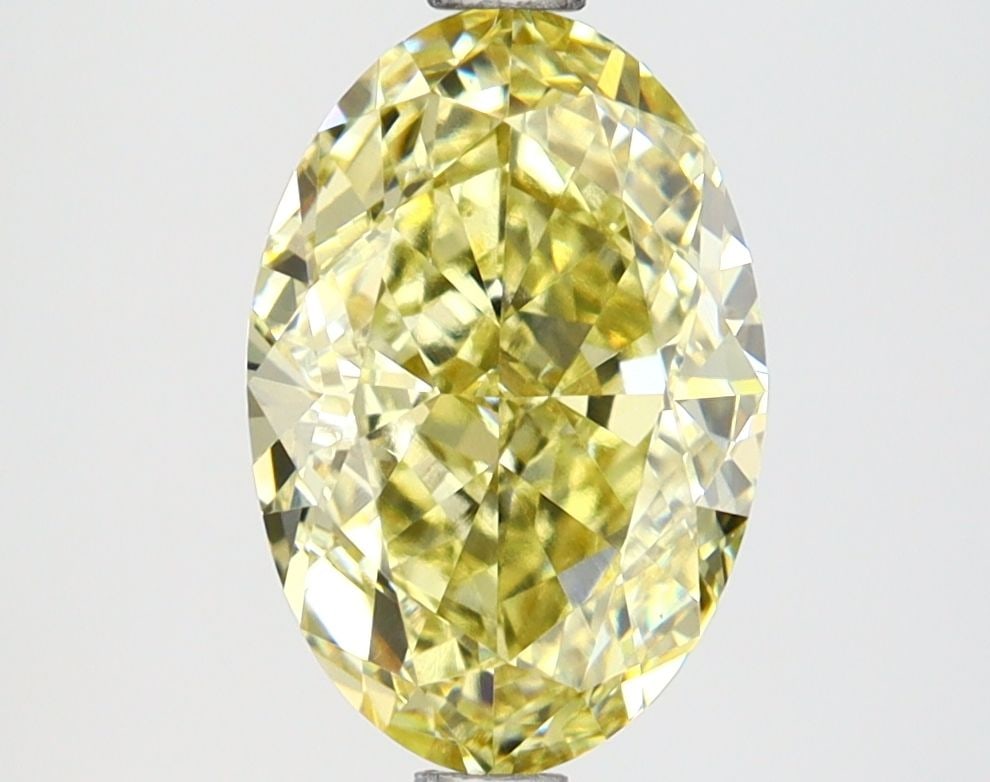 Loose Lab Diamond IGI Oval 2.7ct Fancy Intense Yellow VS1: Loose Lab Diamond IGI Oval 2.7ct Fancy Intense Yellow VS1 Loose lab-grown diamond weighing 2.7ct, oval cut, Fancy Intense Yellow color, VS1 clarity, and IGI certified. Measurements are 10.52L x 7.11W