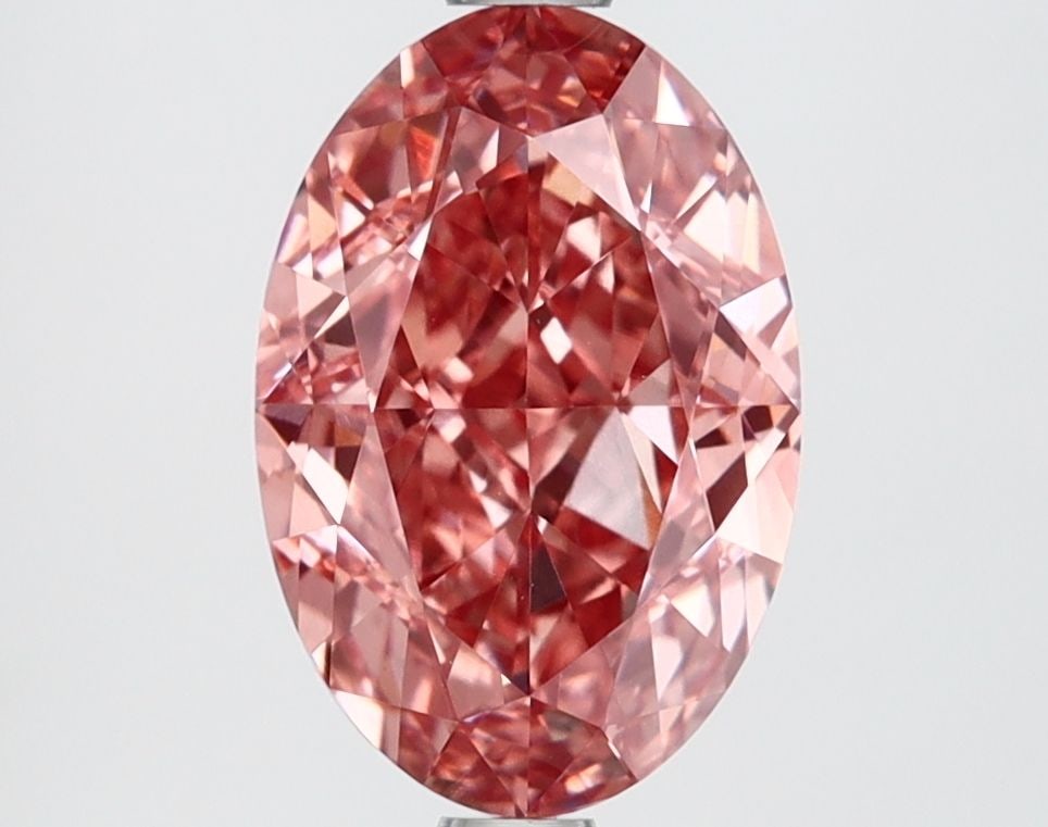 Loose Lab Diamond IGI Oval 2.61ct Fancy Vivid Pink VVS2: Loose Lab Diamond IGI Oval 2.61ct Fancy Vivid Pink VVS2 This 2.61ct loose lab-grown oval diamond showcases a Fancy Vivid Pink color and VVS2 clarity, with excellent polish and symmetry, certified by I