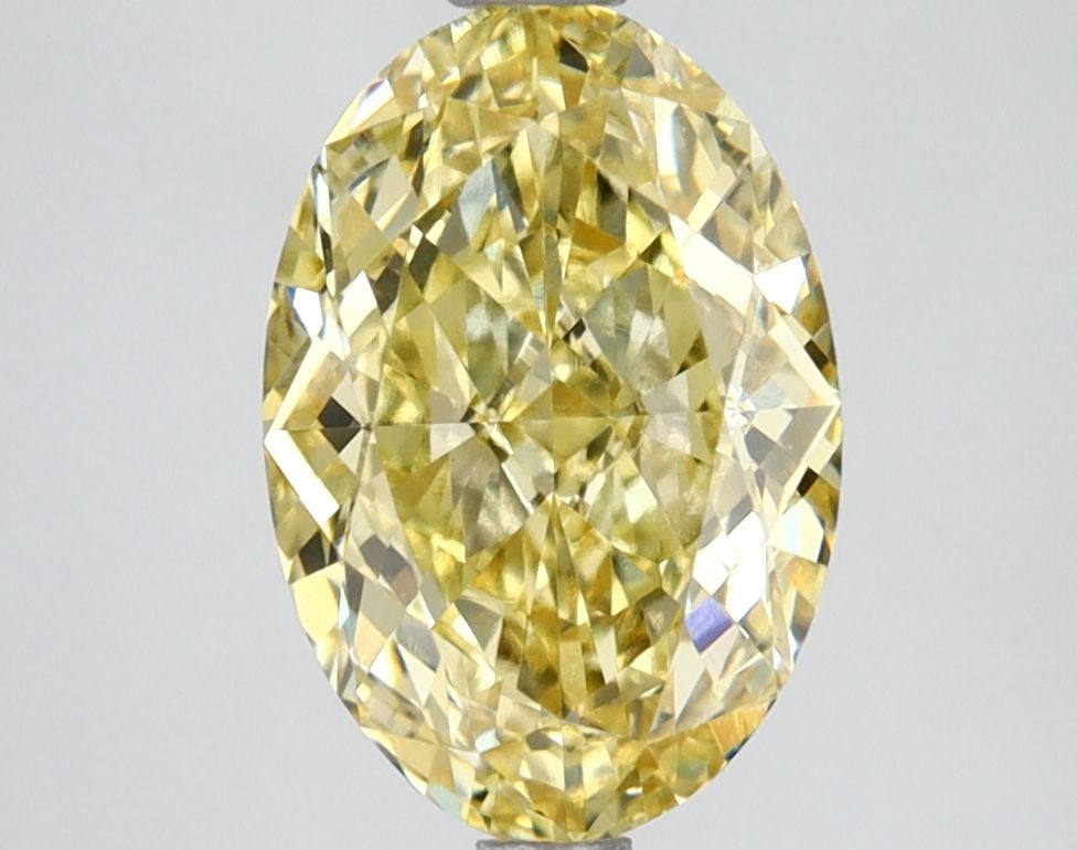 Loose Lab Diamond IGI Oval 2.66ct Fancy Intense Yellow VVS2: Loose Lab Diamond IGI Oval 2.66ct Fancy Intense Yellow VVS2 Loose Lab Diamond IGI Oval, 2.66ct, Fancy Intense Yellow, VVS2 clarity, featuring GD polish and symmetry; measures 10.46L x 7.13W x 4.53H. 