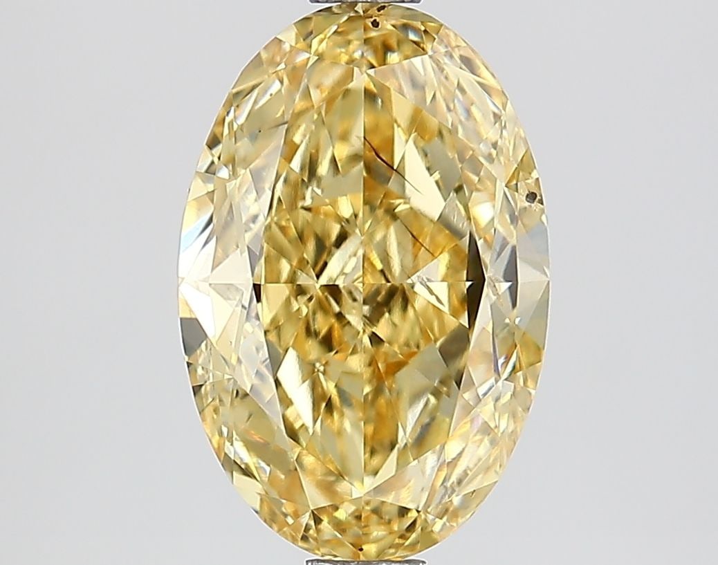 Loose Lab Diamond IGI Oval 2.01ct Fancy Vivid Yellow SI1: Loose Lab Diamond IGI Oval 2.01ct Fancy Vivid Yellow SI1 This Loose Lab Diamond IGI Oval is 2.01ct, with a Fancy Vivid Yellow color and SI1 clarity, offering excellent polish and symmetry. Its dimensi