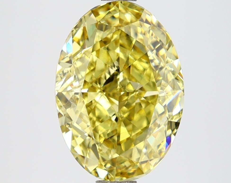 Loose Lab Diamond IGI Oval 2.87ct Fancy Vivid Yellow VS2: Loose Lab Diamond IGI Oval 2.87ct Fancy Vivid Yellow VS2 Loose Lab Diamond IGI Oval, 2.87 ct in Fancy Vivid Yellow, clarity VS2, excellent polish and symmetry, measuring 10.4L x 7.43W x 4.74H. Item Sp