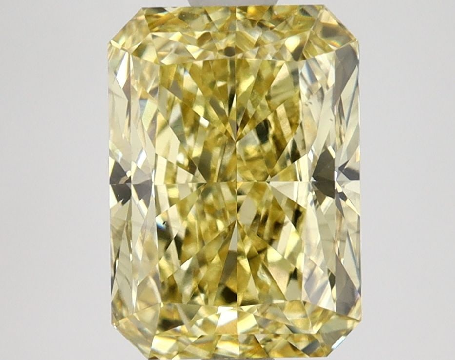 Loose Lab Diamond IGI Radiant 3.23ct Fancy Vivid Yellow VS1: Loose Lab Diamond IGI Radiant 3.23ct Fancy Vivid Yellow VS1 Loose Lab Diamond IGI Radiant, 3.23ct, Fancy Vivid Yellow color, VS1 clarity, dimensions 9.8mm x 6.97mm x 4.9mm, IGI certified. Item Specifi