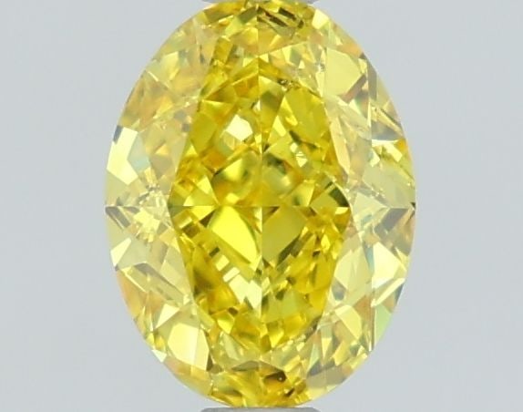 Loose Lab Diamond IGI Oval 1.01ct Fancy Vivid Yellow VS2: Loose Lab Diamond IGI Oval 1.01ct Fancy Vivid Yellow VS2 Loose Lab Diamond IGI Oval, 1.01ct, Fancy Vivid Yellow, VS2 clarity, with measurements of 7.16L x 5.34W x 3.42H, certified by IGI. Item Specifi
