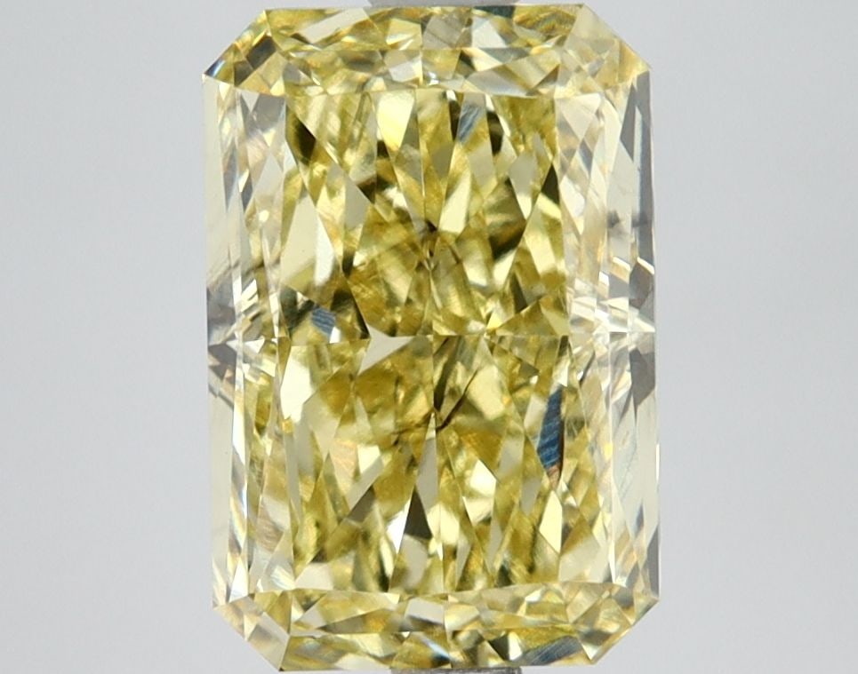 Loose Lab Diamond IGI Radiant 3.11ct Fancy Vivid Yellow SI1: Loose Lab Diamond IGI Radiant 3.11ct Fancy Vivid Yellow SI1 Loose Lab Diamond IGI Radiant 3.11ct in Fancy Vivid Yellow color with SI1 clarity, certified by IGI. Dimensions are 10.05L x 6.76W x 4.75H.