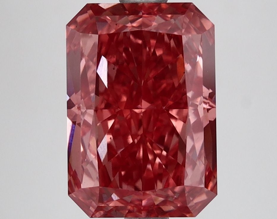Loose Lab Diamond IGI Radiant 3.3ct Fancy Vivid Pink VS2: Loose Lab Diamond IGI Radiant 3.3ct Fancy Vivid Pink VS2 This loose lab diamond weighs 3.3ct with a radiant cut, fancy vivid pink color, and VS2 clarity, certified by IGI, measuring 10.0L x 6.95W x 4.