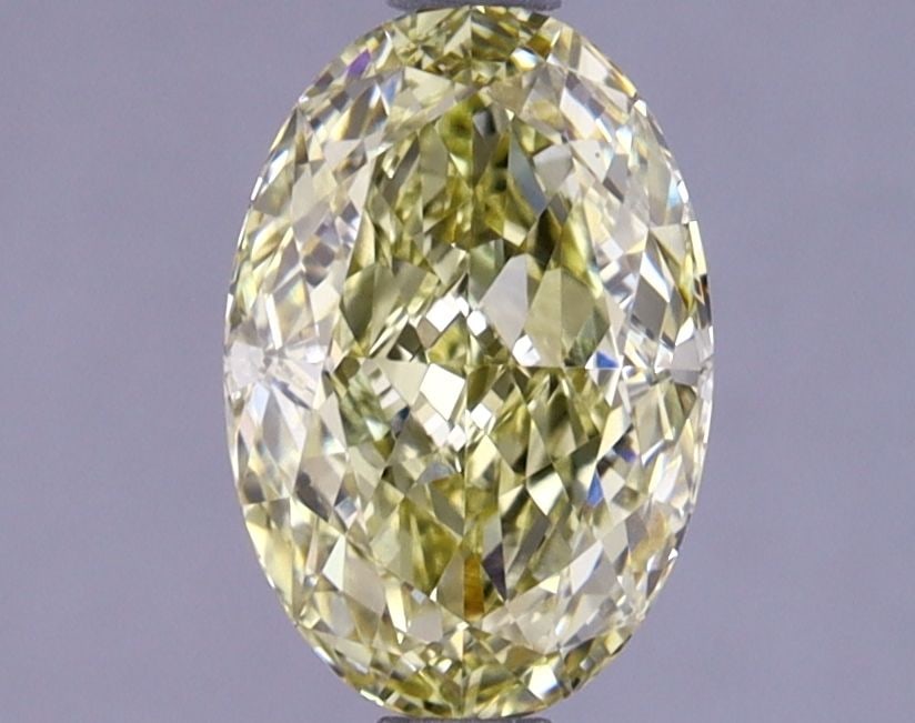 Loose Lab Diamond IGI Oval 1.53ct Fancy Intense Yellow VVS2: Loose Lab Diamond IGI Oval 1.53ct Fancy Intense Yellow VVS2 Loose Lab Diamond IGI Oval 1.53ct Fancy Intense Yellow VVS2, displaying Excellent polish and symmetry, measuring 8.83L X 5.98W X 3.72H, cert