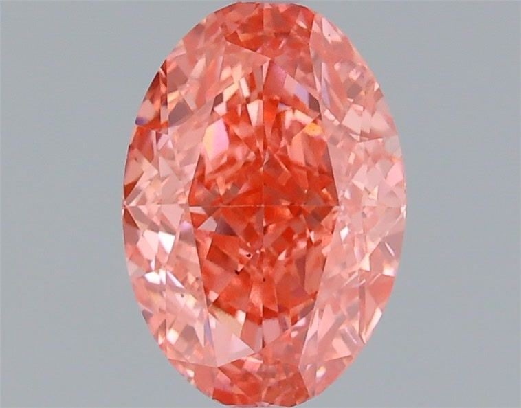 Loose Lab Diamond 1.07ct Fancy Vivid Pink VS2 - IGI Oval: Loose Lab Diamond 1.07ct Fancy Vivid Pink VS2 - IGI Oval Loose lab-grown diamond of 1.07ct, featuring a Fancy Vivid Pink color and VS2 clarity, certified by IGI, measurements 7.55L x 5.21W x 3.45H. It