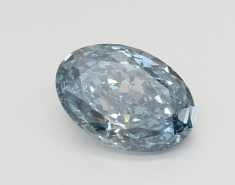 Oval IGI 1.72ct Fancy Vivid Blue SI1 - Loose Lab Diamond: Oval IGI 1.72ct Fancy Vivid Blue SI1 - Loose Lab Diamond This 1.72ct oval lab diamond showcases a Fancy Vivid Blue color and SI1 clarity, featuring excellent polish and symmetry, with measurements of