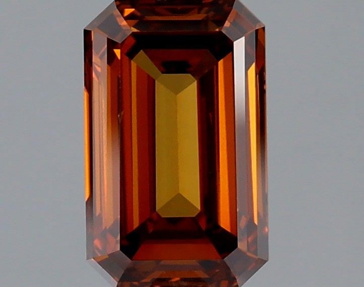 Loose Lab Diamond IGI Emerald 1.67ct Fancy Vivid Brownish Orange VVS2: Loose Lab Diamond IGI Emerald 1.67ct Fancy Vivid Brownish Orange VVS2 Loose lab-grown diamond weighing 1.67ct with an emerald cut, color Fancy Vivid Brownish Orange, and clarity VVS2. Certified by IGI