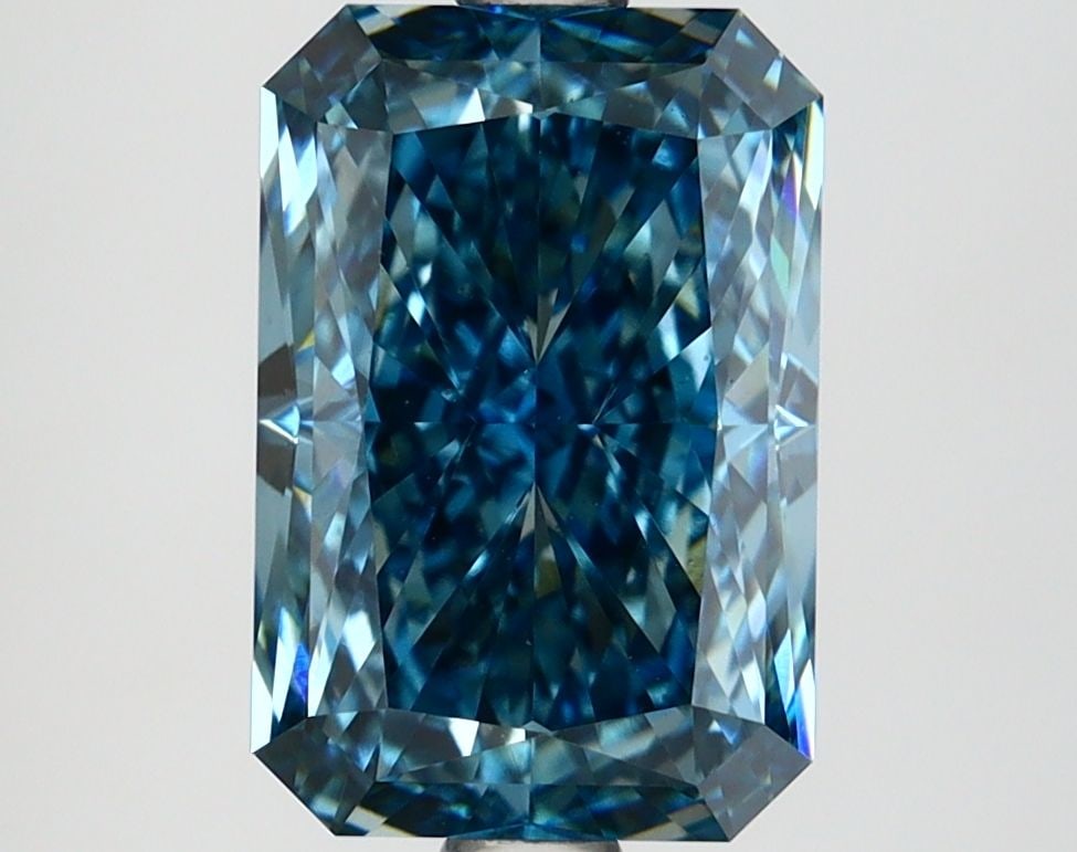 Loose Lab Diamond IGI Radiant 3.06ct Fancy Vivid Blue VS1: Loose Lab Diamond IGI Radiant 3.06ct Fancy Vivid Blue VS1 Loose lab-created diamond weighing 3.06 carats, color fancy vivid blue, and clarity VS1, certified by IGI. It features excellent polish and sy