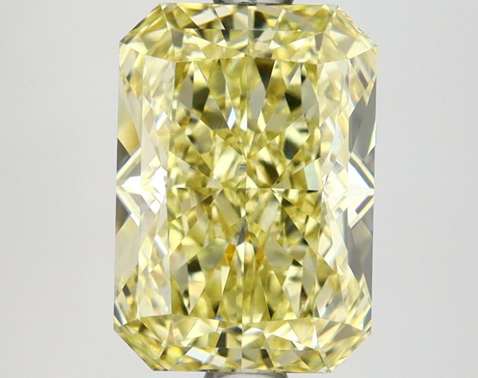 Loose Lab Diamond IGI Radiant 2.75ct Fancy Intense Yellow VS1: Loose Lab Diamond IGI Radiant 2.75ct Fancy Intense Yellow VS1 This 2.75ct loose lab-grown diamond features a radiant cut, fancy intense yellow color, and VS1 clarity, certified by IGI. It measures 9.5