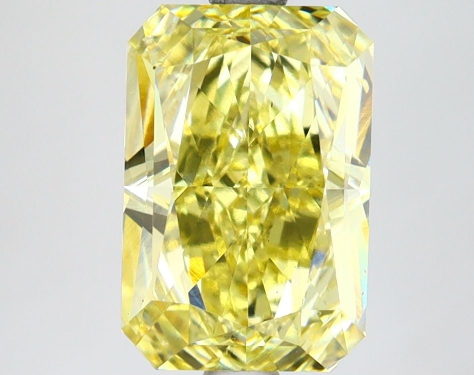 Loose Lab Diamond IGI Radiant 3.0ct Fancy Intense Yellow VS2: Loose Lab Diamond IGI Radiant 3.0ct Fancy Intense Yellow VS2 A 3.0ct loose lab-grown radiant diamond, this piece showcases a fancy intense yellow color with VS2 clarity, certified by IGI. It measures