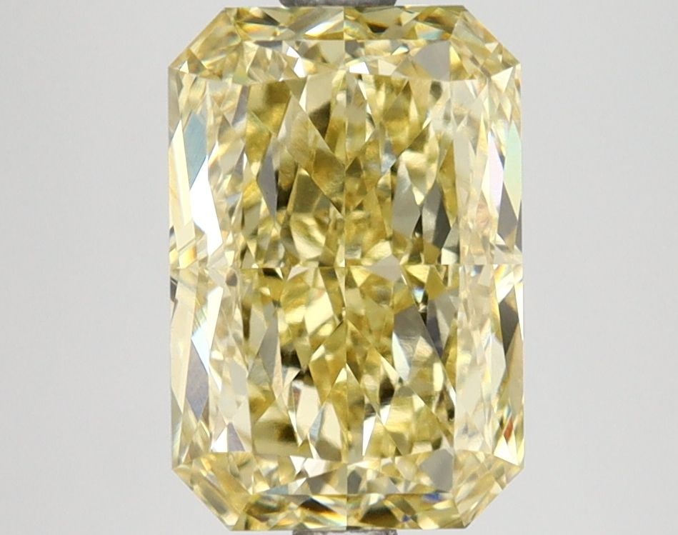 Loose Lab Diamond 3.03ct IGI Radiant Fancy Yellow VVS2: Loose Lab Diamond 3.03ct IGI Radiant Fancy Yellow VVS2 Loose lab-created diamond of 3.03ct with fancy yellow color and VVS2 clarity, certified by IGI. Dimensions are 9.97L X 6.73W X 4.53H. Item Specif
