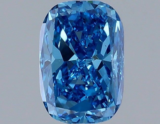Loose Lab Diamond 1.05ct Fancy Vivid Blue VS1 - IGI Cushion Modified: Loose Lab Diamond 1.05ct Fancy Vivid Blue VS1 - IGI Cushion Modified Loose lab-created diamond of 1.05ct, featuring a fancy vivid blue color, VS1 clarity, and IGI certification. Dimensions are 7.19L X