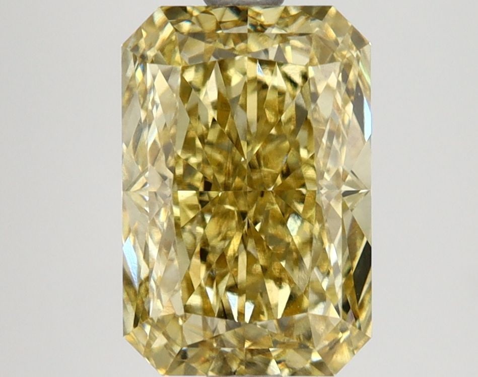 Loose Lab Diamond 3.08ct IGI Radiant Fancy Intense Yellow VS2: Loose Lab Diamond 3.08ct IGI Radiant Fancy Intense Yellow VS2 Loose lab-created diamond of 3.08ct, featuring a fancy intense yellow color and VS2 clarity, certified by IGI. Dimensions are 10.0L X 6.73