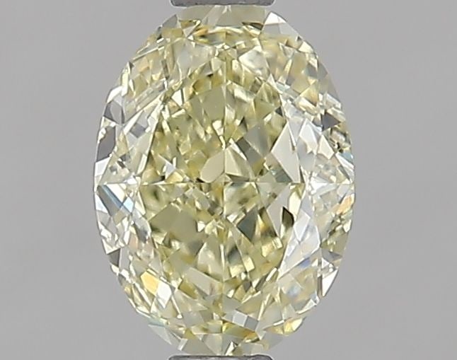 Loose Lab Diamond IGI Oval 1.0ct Fancy Yellow VS1: Loose Lab Diamond IGI Oval 1.0ct Fancy Yellow VS1 Loose Lab Diamond IGI Oval 1.0ct Fancy Yellow with VS1 clarity, excellent polish and symmetry, measuring 7.35L x 5.32W x 3.32H, certified by IGI. Item