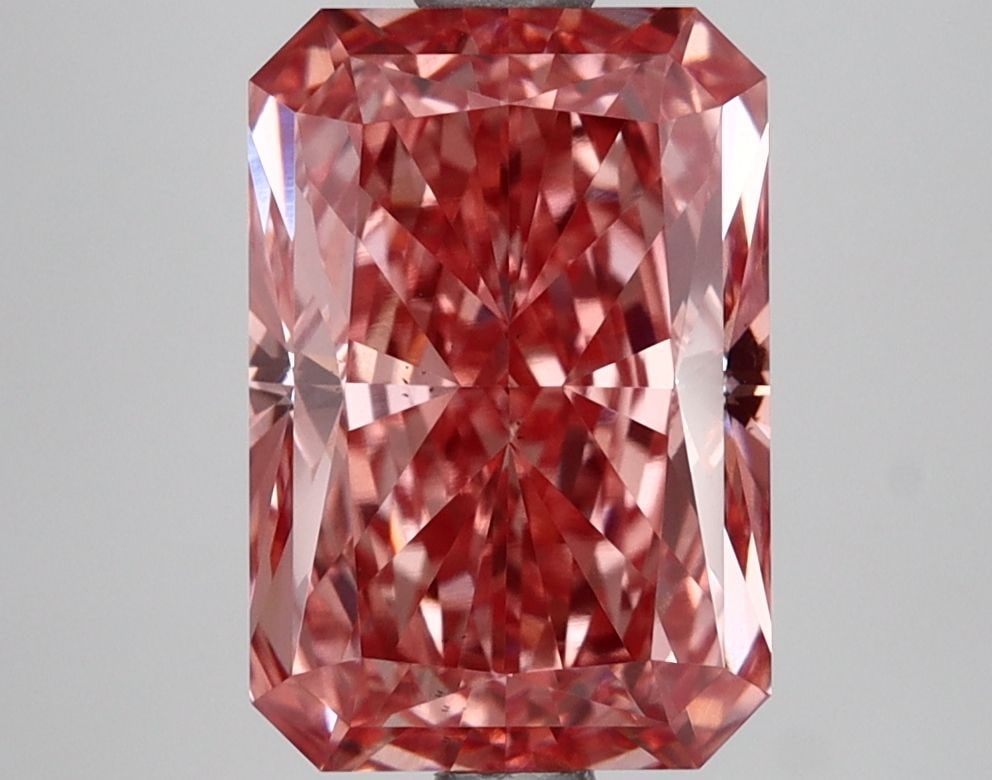 Loose Lab Diamond IGI Radiant 2.7ct Fancy Vivid Pink VS2: Loose Lab Diamond IGI Radiant 2.7ct Fancy Vivid Pink VS2 This 2.7ct Loose Lab Diamond exhibits a Fancy Vivid Pink color and VS2 clarity, certified by IGI, with measurements of 9.52L x 6.5W x 4.53H. It