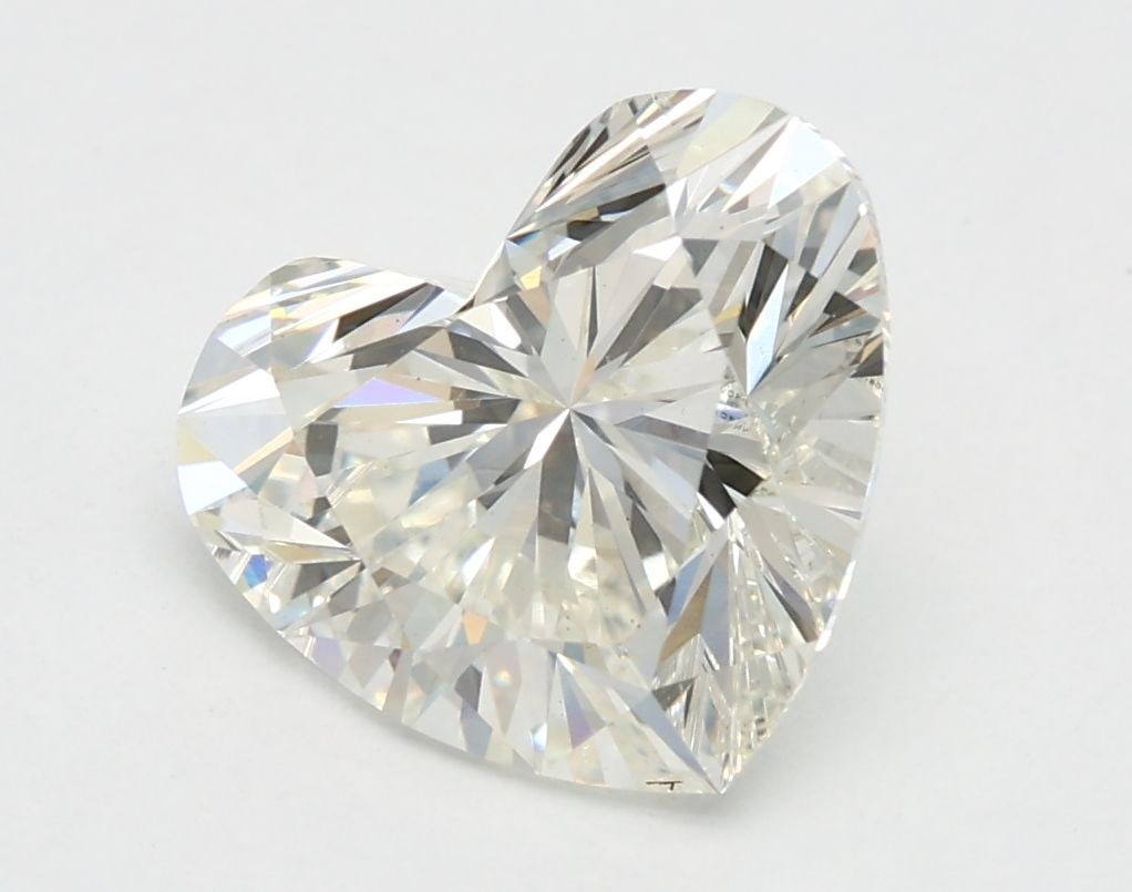 Loose Lab Diamond IGI Heart 2.1ct J VS2: Loose Lab Diamond IGI Heart 2.1ct J VS2 This 2.1ct Loose Lab Diamond is a Heart cut with J color and VS2 clarity, certified by IGI, measuring 7.79L x 8.97W x 5.34H. Item Specifics: Source: This Is A R