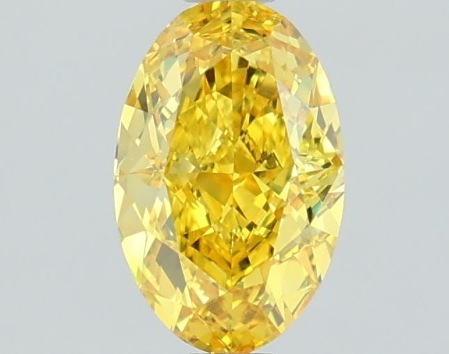 Loose Lab Diamond IGI Oval 1.09ct Fancy Vivid Yellow VVS1: Loose Lab Diamond IGI Oval 1.09ct Fancy Vivid Yellow VVS1 Loose lab-grown diamond certified by IGI, weighing 1.09ct, fancy vivid yellow color, and VVS1 clarity, exhibiting very good polish and symmetr