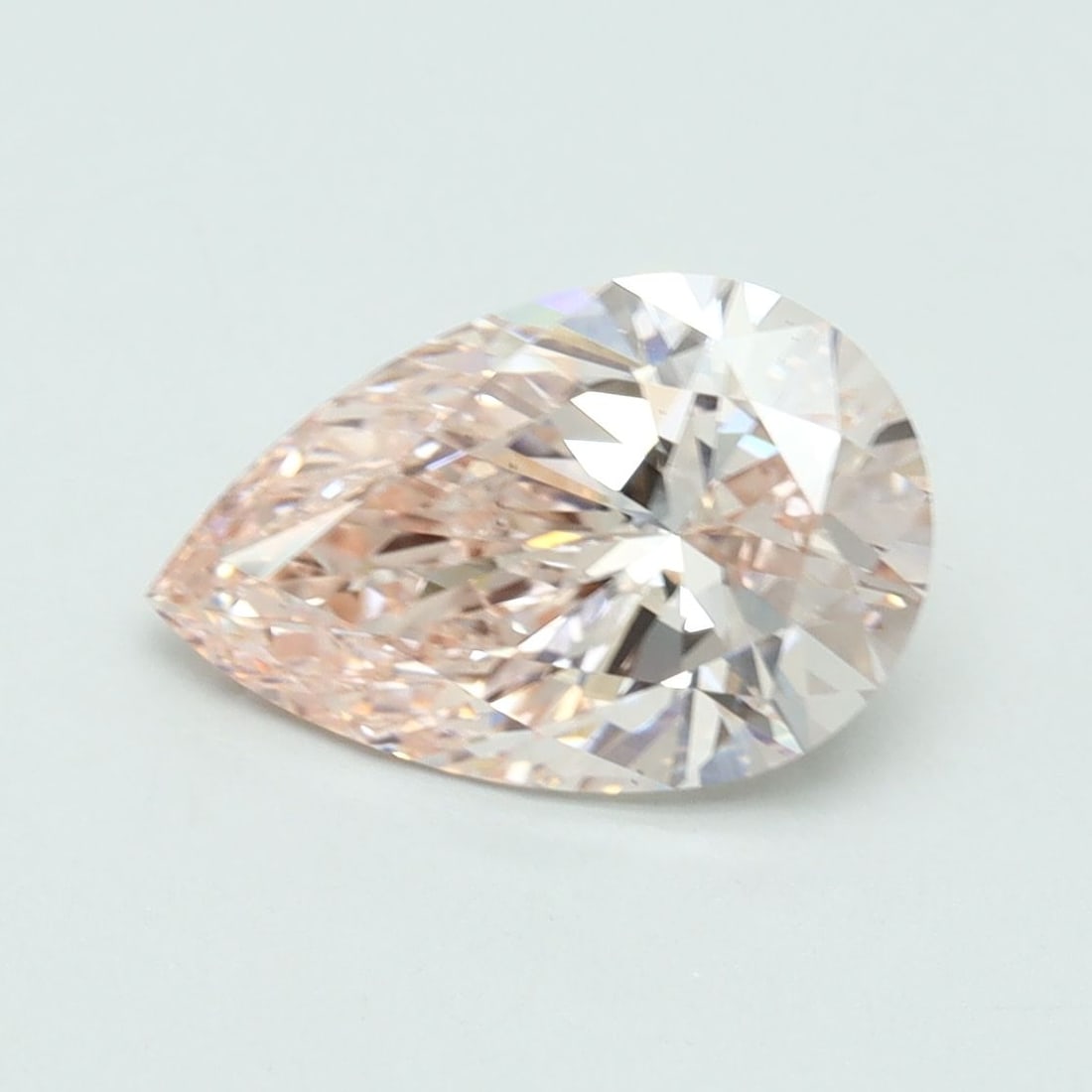 Loose Lab Diamond IGI Pear 2.01ct Fancy Pink VS2: Loose Lab Diamond IGI Pear 2.01ct Fancy Pink VS2 Loose lab-grown diamond, IGI certified, with a carat weight of 2.01, pear cut, fancy pink color, VS2 clarity, and measurements of 10.99L x 7.09W x 4.41