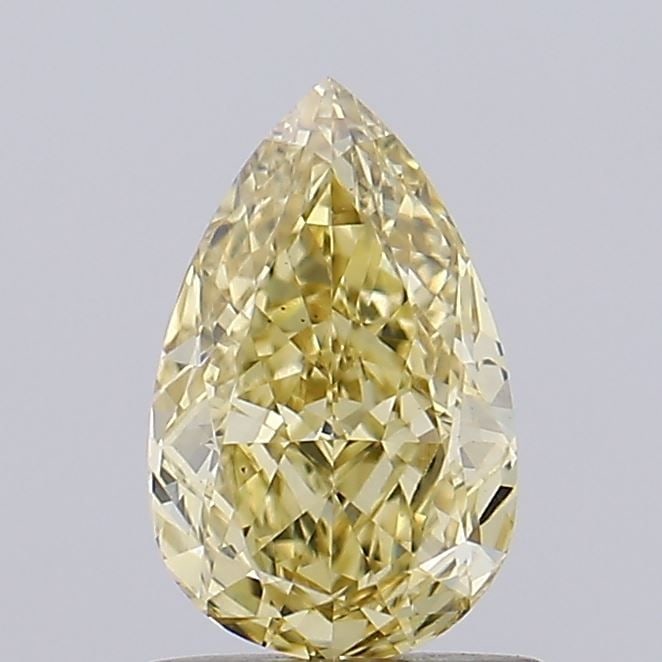 IGI Loose Lab Diamond Pear 1.08ct Fancy Yellow VS1: IGI Loose Lab Diamond Pear 1.08ct Fancy Yellow VS1 Loose lab-grown diamond, IGI certified, weighing 1.08ct with a pear cut, fancy yellow color, clarity VS1, and excellent polish and symmetry. Measurem