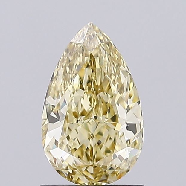 Loose Lab Diamond IGI Pear 1.07ct Fancy Yellow VVS2: Loose Lab Diamond IGI Pear 1.07ct Fancy Yellow VVS2 Loose lab-grown diamond, 1.07ct, pear cut, Fancy Yellow color, VVS2 clarity, with EX polish and VG symmetry, certified by IGI, measuring 8.58L x 5.3