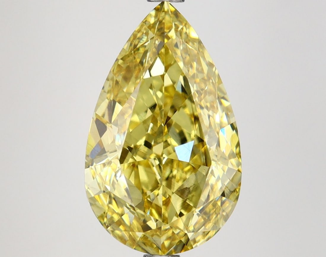 IGI 4.62ct Pear Fancy Vivid Yellow VS2 - Loose Lab Diamond: IGI 4.62ct Pear Fancy Vivid Yellow VS2 - Loose Lab Diamond IGI 4.62ct Pear Fancy Vivid Yellow VS2 loose lab diamond offers a fancy vivid yellow color and VS2 clarity, with excellent polish and symmetr
