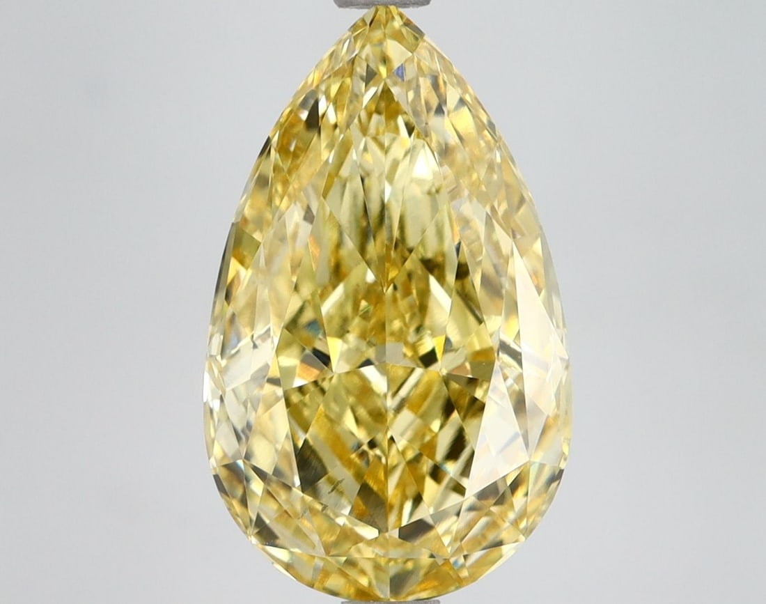 Loose Lab Diamond IGI Pear 4.59ct Fancy Vivid Yellow VS2: Loose Lab Diamond IGI Pear 4.59ct Fancy Vivid Yellow VS2 Loose Lab Diamond IGI Pear 4.59ct in Fancy Vivid Yellow, with VS2 clarity and good polish and symmetry. Certified by IGI, it measures 14.64L x