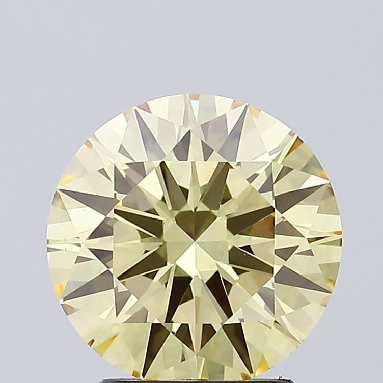 Loose Lab Diamond - IGI Round 2.6ct Fancy Yellow VS1: Loose Lab Diamond - IGI Round 2.6ct Fancy Yellow VS1 The 2.6ct Loose Lab Diamond exhibits a Fancy Yellow color with VS1 clarity, featuring VG polish and symmetry, and is certified by IGI. Item Specifi