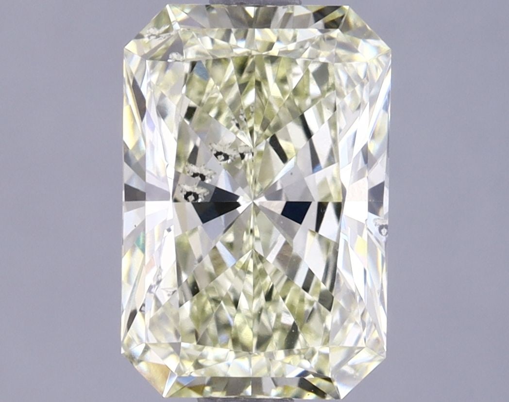 Loose Lab Diamond IGI Radiant 2.12ct Fancy Yellow SI1: Loose Lab Diamond IGI Radiant 2.12ct Fancy Yellow SI1 Loose Lab Diamond IGI Radiant 2.12ct Fancy Yellow SI1; has Good polish and symmetry, measuring 9.31L x 6.28W x 4.31H, with IGI certification. Item