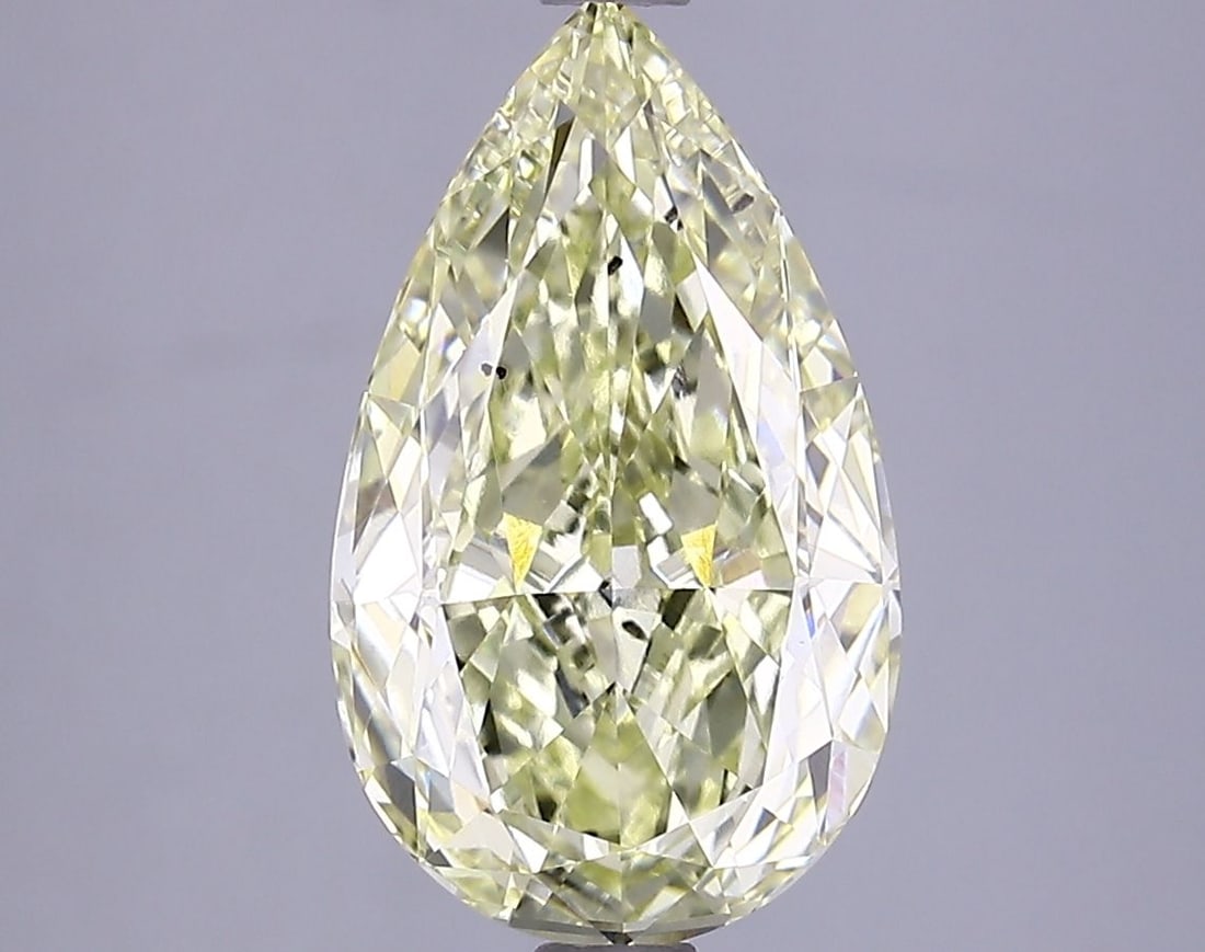 Loose Lab Diamond IGI Pear 3.22ct Fancy Yellow VS2: Loose Lab Diamond IGI Pear 3.22ct Fancy Yellow VS2 Loose Lab Diamond IGI Pear 3.22ct with Fancy Yellow color and VS2 clarity, featuring good polish and symmetry, measured at 13.21L x 7.84W x 4.54H. Ce
