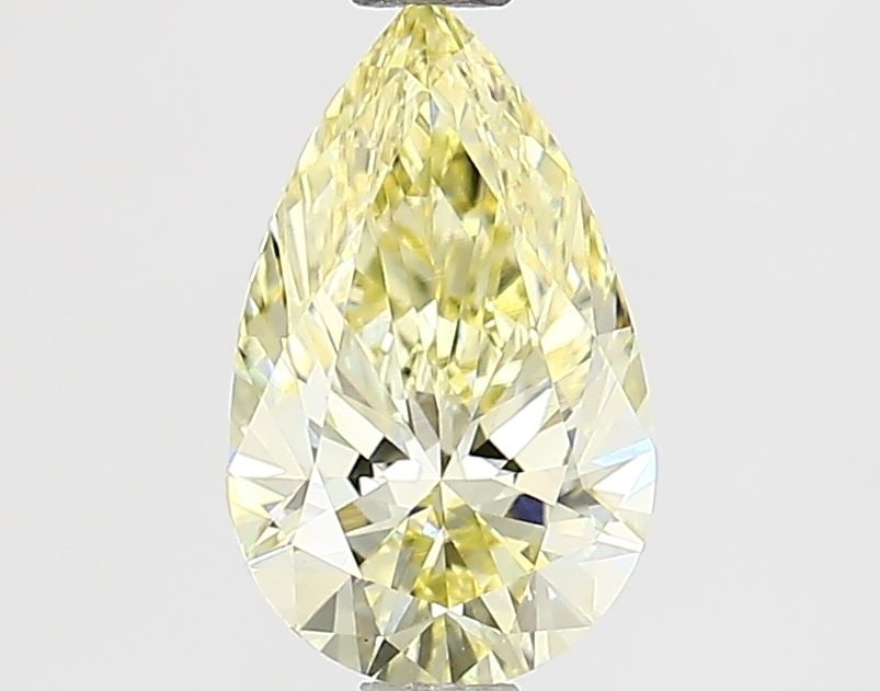 Loose Lab Diamond IGI Pear 1.03ct Fancy Yellow VS1: Loose Lab Diamond IGI Pear 1.03ct Fancy Yellow VS1 Loose lab-grown diamond pear cut, 1.03ct, Fancy Yellow color, VS1 clarity, with excellent polish and symmetry, measures 9.26 x 5.65 x 3.42 mm, certif