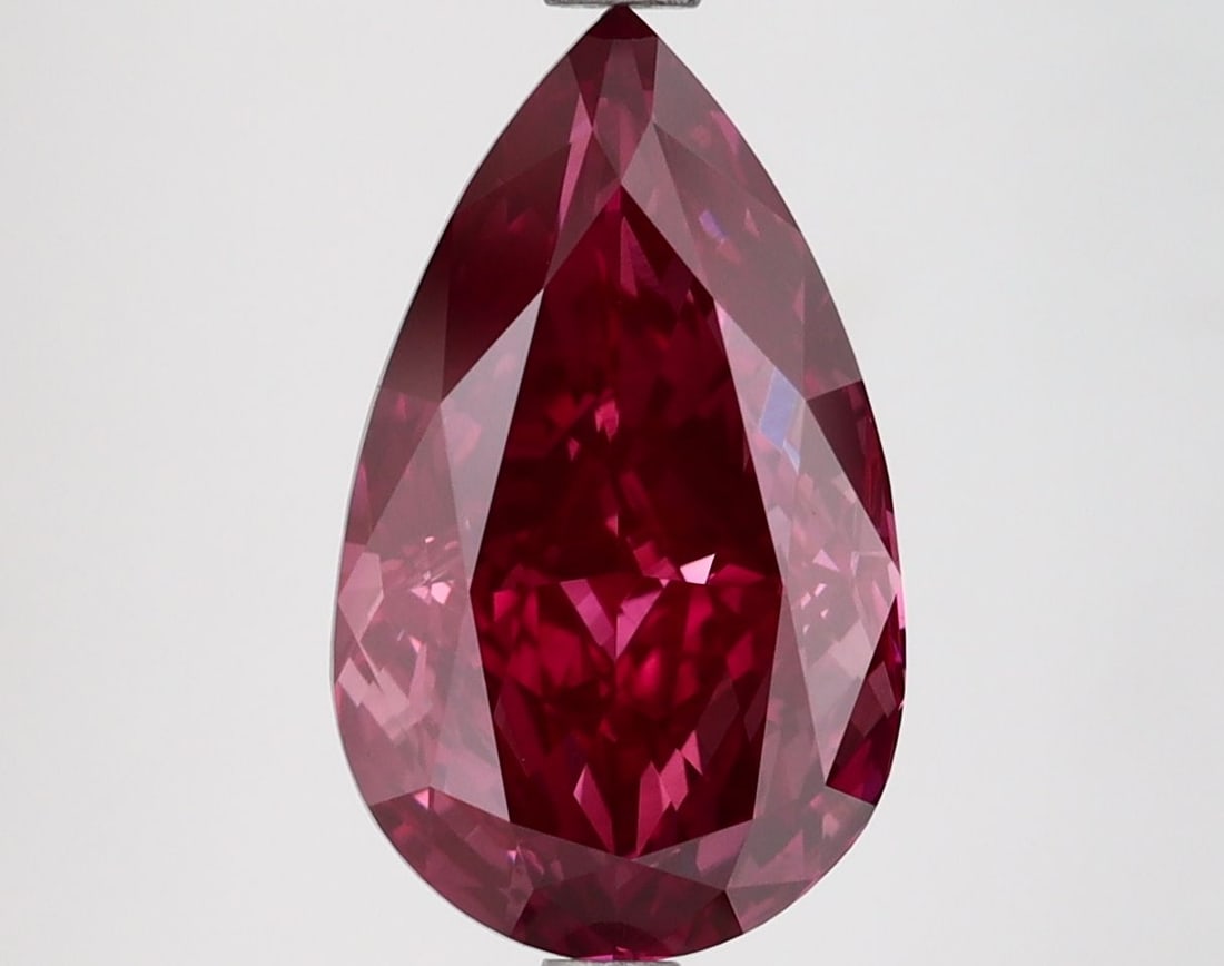 Loose Lab Diamond IGI Pear 3.1ct Fancy Deep Pink VVS2: Loose Lab Diamond IGI Pear 3.1ct Fancy Deep Pink VVS2 A 3.1ct pear lab diamond with Fancy Deep Pink color and VVS2 clarity, exhibiting GD polish and symmetry, certified by IGI, measuring 12.96L x 7.76