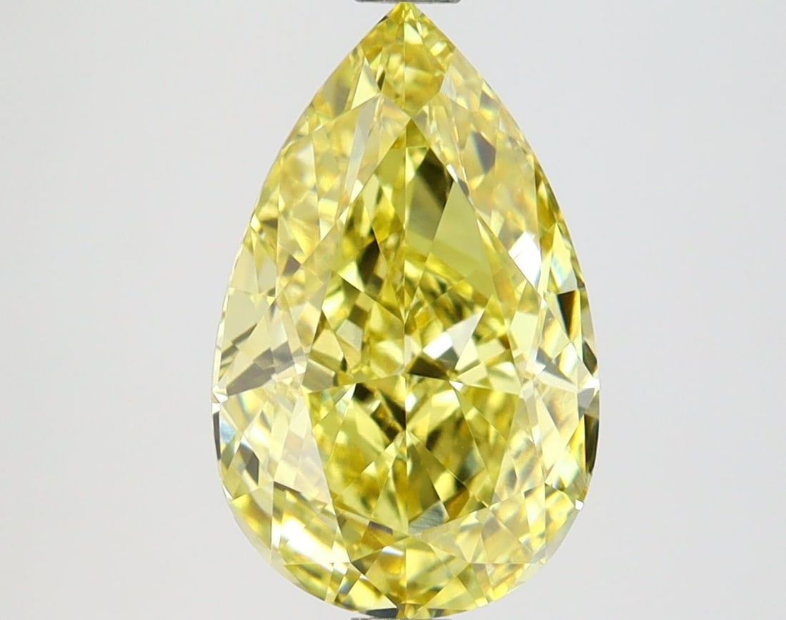 Loose Lab Diamond IGI Pear 3.09ct Fancy Vivid Yellow VVS2: Loose Lab Diamond IGI Pear 3.09ct Fancy Vivid Yellow VVS2 This 3.09ct pear lab diamond has a Fancy Vivid Yellow color and VVS2 clarity, exhibiting GD polish and symmetry, certified by IGI, measuring 1