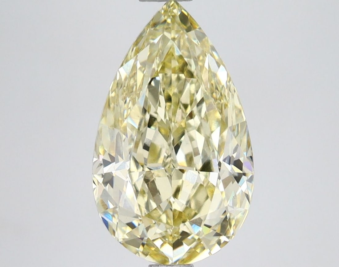 Loose Lab Diamond IGI Pear 3.06ct Fancy Yellow VS1: Loose Lab Diamond IGI Pear 3.06ct Fancy Yellow VS1 This loose lab-grown diamond weighs 3.06ct, features a fancy yellow color and VS1 clarity, with excellent polish and symmetry, and is certified by IG