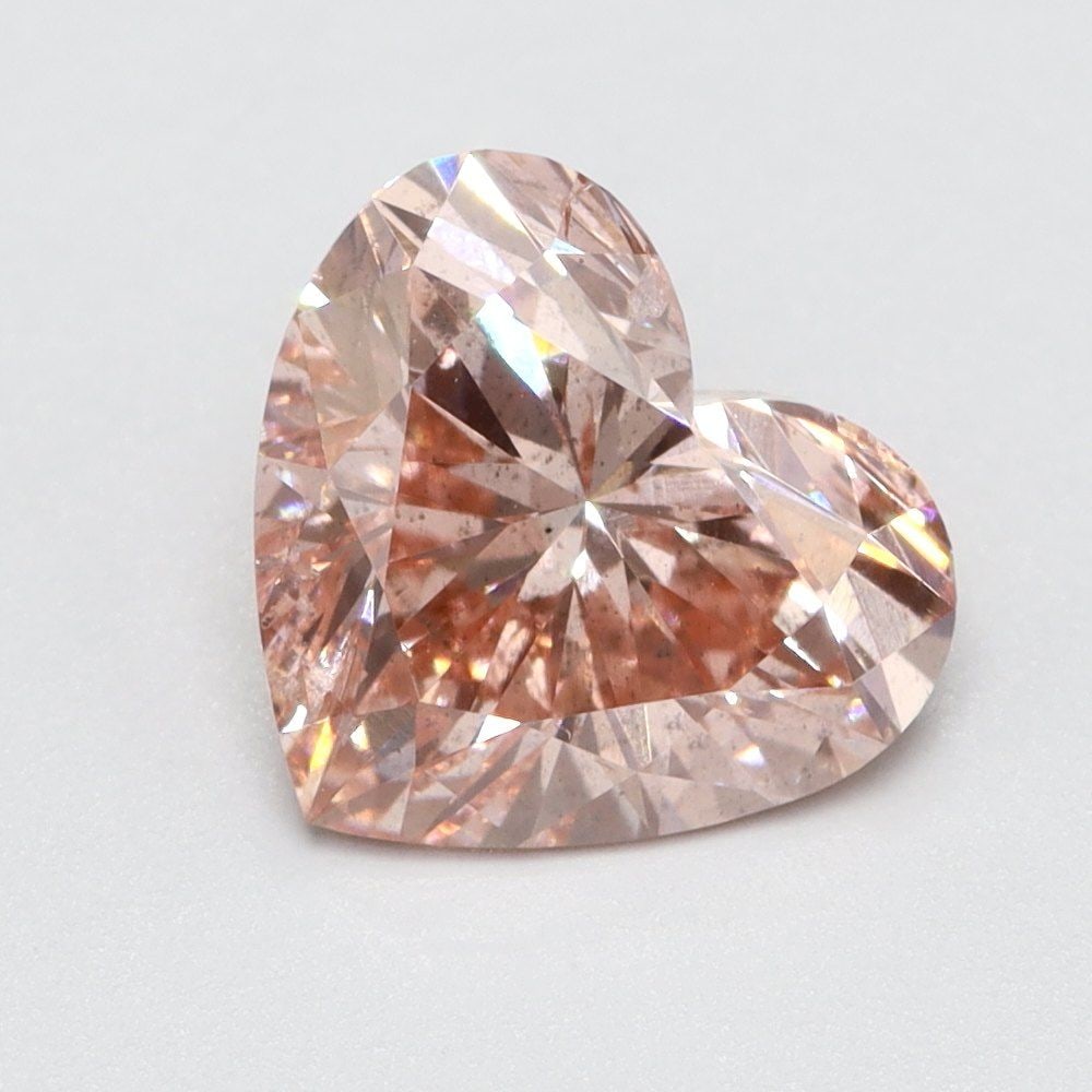 Loose Lab Diamond 1.02ct Fancy Vivid Pink SI2 - Heart: Loose Lab Diamond 1.02ct Fancy Vivid Pink SI2 - Heart Loose Lab Diamond, 1.02ct, Fancy Vivid Pink, clarity SI2, with very good polish and symmetry. Uncertified. Item Specifics: Source: This Is A Real